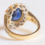 Vintage 14K yellow and white gold daisy ring with synthetic sapphire (approx. 2.50ct) and brilliant cut diamonds (approx. 1.80ctw), 80s