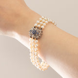Vintage-Armband aus 18 Karat Weißgold mit weißen Perlen und Saphiren, 50er Jahre