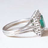 Vintage French daisy ring in platinum and 18K white gold with emerald (approx. 0.90ct) and diamonds (approx. 0.70ctw), 50s/60s