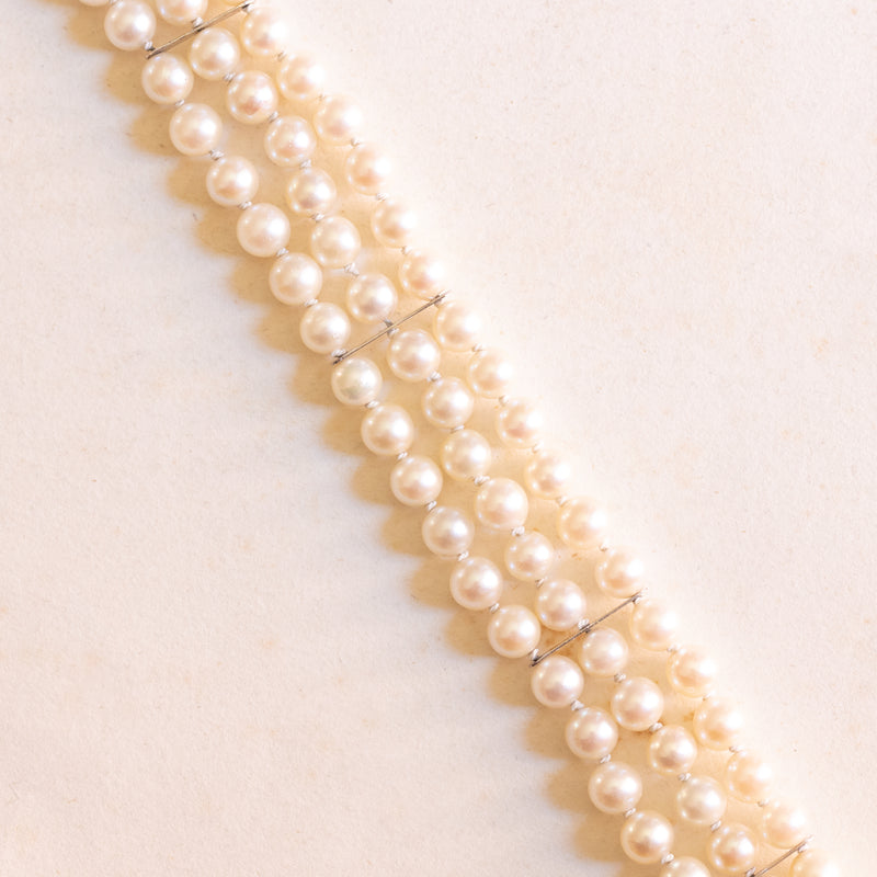 Braccialetto vintage in oro bianco 18K con perle bianche e zaffiri, anni ‘50
