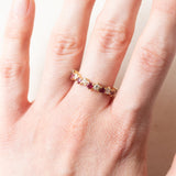 Halbe Ewigkeit aus 18-karätigem Gelbgold mit Rubinen (ca. 0.60 ctw) und Diamanten im Brillantschliff (ca. 0.42 ctw), 70er/80er Jahre