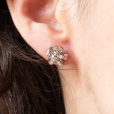 Boucles d'oreilles vintage en or blanc 18 carats et diamants taillés en brillant (environ 0.40 ct), 80