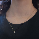 Vintage-Lichtpunkt-Anhänger aus 9 Karat Gelb- und Weißgold mit Diamant im Brillantschliff (ca. 0.15 ct), 70er/80er Jahre