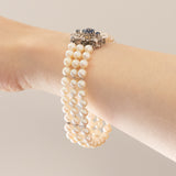 Vintage-Armband aus 18 Karat Weißgold mit weißen Perlen und Saphiren, 50er Jahre