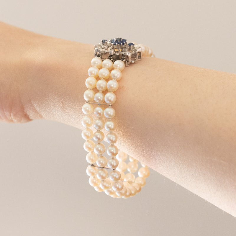 Braccialetto vintage in oro bianco 18K con perle bianche e zaffiri, anni ‘50