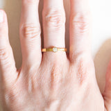 Vintage Solitär aus 18 Karat Gelbgold im Brillantschliff (ca. 0.15 ct), 70er Jahre