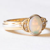 Vintage-Ring aus 18-karätigem Gelb- und Weißgold mit Opal (ca. 0.90 ct) und Diamanten im Brillantschliff (ca. 0.06 ctw), 70er Jahre
