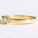 Vintage Solitär aus 18 Karat Gelbgold im Brillantschliff (ca. 0.15 ct), 70er Jahre