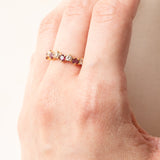 Halbe Ewigkeit aus 18-karätigem Gelbgold mit Rubinen (ca. 0.60 ctw) und Diamanten im Brillantschliff (ca. 0.42 ctw), 70er/80er Jahre