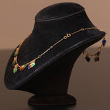 Vintage-Halskette aus 18-karätigem Gelbgold mit herzförmigen Anhängern und roter, orangefarbener, grüner und blauer Emaille, 70er Jahre