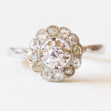 Bague marguerite française ancienne en platine avec diamants (taille centrale en brillant d'environ 0.15 ct), années 10/20