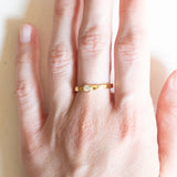 Vintage Solitär aus 18 Karat Gelbgold im Brillantschliff (ca. 0.15 ct), 70er Jahre