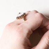 Vintage Gänseblümchenring aus 8 Karat Gelbgold mit Granaten und Bergkristall, 60er Jahre