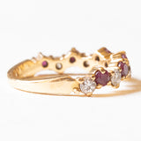 Halbe Ewigkeit aus 18-karätigem Gelbgold mit Rubinen (ca. 0.60 ctw) und Diamanten im Brillantschliff (ca. 0.42 ctw), 70er/80er Jahre