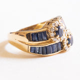 Vintage-Ring aus 18-karätigem Gelbgold mit Saphiren (zentral ca. 0.44 ctw) und Diamanten im Brillantschliff (ca. 0.70 ctw), 60er/70er Jahre