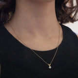 Vintage-Lichtpunkt-Anhänger aus 9 Karat Gelb- und Weißgold mit Diamant im Brillantschliff (ca. 0.15 ct), 70er/80er Jahre