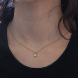 Vintage-Lichtpunkt-Anhänger aus 9 Karat Gelb- und Weißgold mit Diamant im Brillantschliff (ca. 0.15 ct), 70er/80er Jahre