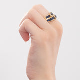 Vintage-Ring aus 18-karätigem Gelbgold mit Saphiren (zentral ca. 0.44 ctw) und Diamanten im Brillantschliff (ca. 0.70 ctw), 60er/70er Jahre