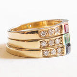 Tres anillos antiguos de oro amarillo de 14 quilates con rubí (aprox. 0.15 ct), esmeralda (0.15 ct), zafiro (aprox. 0.20 ct) y diamantes (aprox. 0.30 ct), años 70