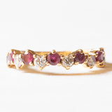 Halbe Ewigkeit aus 18-karätigem Gelbgold mit Rubinen (ca. 0.60 ctw) und Diamanten im Brillantschliff (ca. 0.42 ctw), 70er/80er Jahre