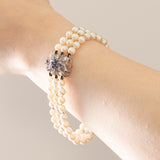 Vintage-Armband aus 18 Karat Weißgold mit weißen Perlen und Saphiren, 50er Jahre