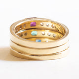 Три винтажных кольца из 14-каратного желтого золота с рубином (около 0.15 карата), изумрудом (0.15 карата), сапфиром (около 0.20 карата) и бриллиантами (около 0.30 карата), 70-е годы