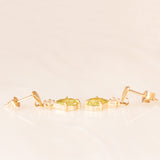 Винтажные серьги-подвески из желтого золота 9 карат с зелеными перидотами (около 0.80 карата) и искусственными бриллиантами, 80-е годы
