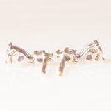 Boucles d'oreilles Point Light en or blanc 9 carats avec tanzanites (environ 0.22 ct au total) et diamants, années 80