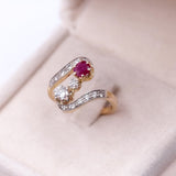 ART NOUVEAU RING IN 18K YELLOW AND WHITE GOLD WITH RUBY (0.55CT APPROX.) AND DIAMONDS (0.70CTW APPROX.), LATE 20s