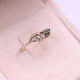 Anello vintage in oro giallo 9K con diamanti e smeraldi