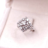 VINTAGE 18K WHITE GOLD RING WITH BRILLIANT CUT DIAMONDS (APPROX. 0.57CTW), 70s