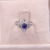Anello vintage in platino a ballerina con zaffiro cabochon (1.88ct) e diamanti (0,63ctw)