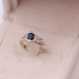 Anello vintage in oro giallo 14k con zaffiro (0,70ct) e diamanti (0,20ctw), anni '70