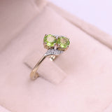 Anello vintage in oro 9k con peridoti e diamanti
