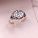 Anello antico in oro giallo 11K e argento con diamante centrale (1.50ct ca.) e rosette, primi del '900
