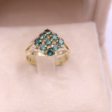 Anello vintage in oro giallo 8k con spinelli verdi