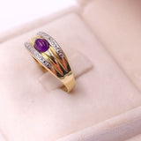 Anello a fascia vintage in oro 8K con ametista cabochon