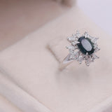 ANELLO A FIORE IN PLATINO CON ZAFFIRO AUSTRALIANO (2.26CT) E DIAMANTI (0.84CTW)