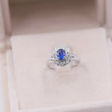 ANELLO VINTAGE A BALLERINA IN PLATINO CON ZAFFIRO (0.56CT) E DIAMANTI (0.46CTW)
