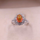 Anello vintage a ballerina in platino 900 con opale di fuoco (1,53ct) e diamanti (0,51ctw)