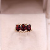 Anello vintage trilogy in oro giallo 14k con granati