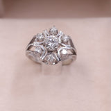 Bague fleur vintage en or blanc 14 carats avec diamant central de 0,80 ct et diamants environnants de 0,36 ct, années 70