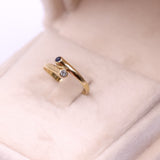 Anello contrarier in oro giallo 18k con diamante e zaffiro, anni '70