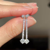 Orecchini pendenti vintage in oro bianco 18K con diamanti (1.15ctw), anni ‘90