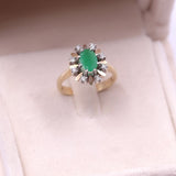 Anello vintage in oro giallo 14k con smeraldo (0,50ct) e diamanti (0,08ctw)