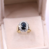 Anello vintage a margherita in oro giallo e bianco 14k con zaffiro (1,50ct) e diamanti (0,70ctw), anni '70