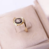 Anello vintage in oro giallo 18k con zaffiro nero stellato, anni '70