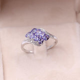 Anello vintage in oro bianco 14k con tanzaniti (1,20ctw) e diamanti