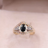 Anello vintage in oro giallo 14k con zaffiro (0,75ct) e diamanti (0,15ctw), anni '70
