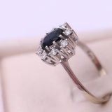 Vintage 18k white gold daisy ring with sapphire (1,50ctw) and diamonds (0.40ctw), 60s